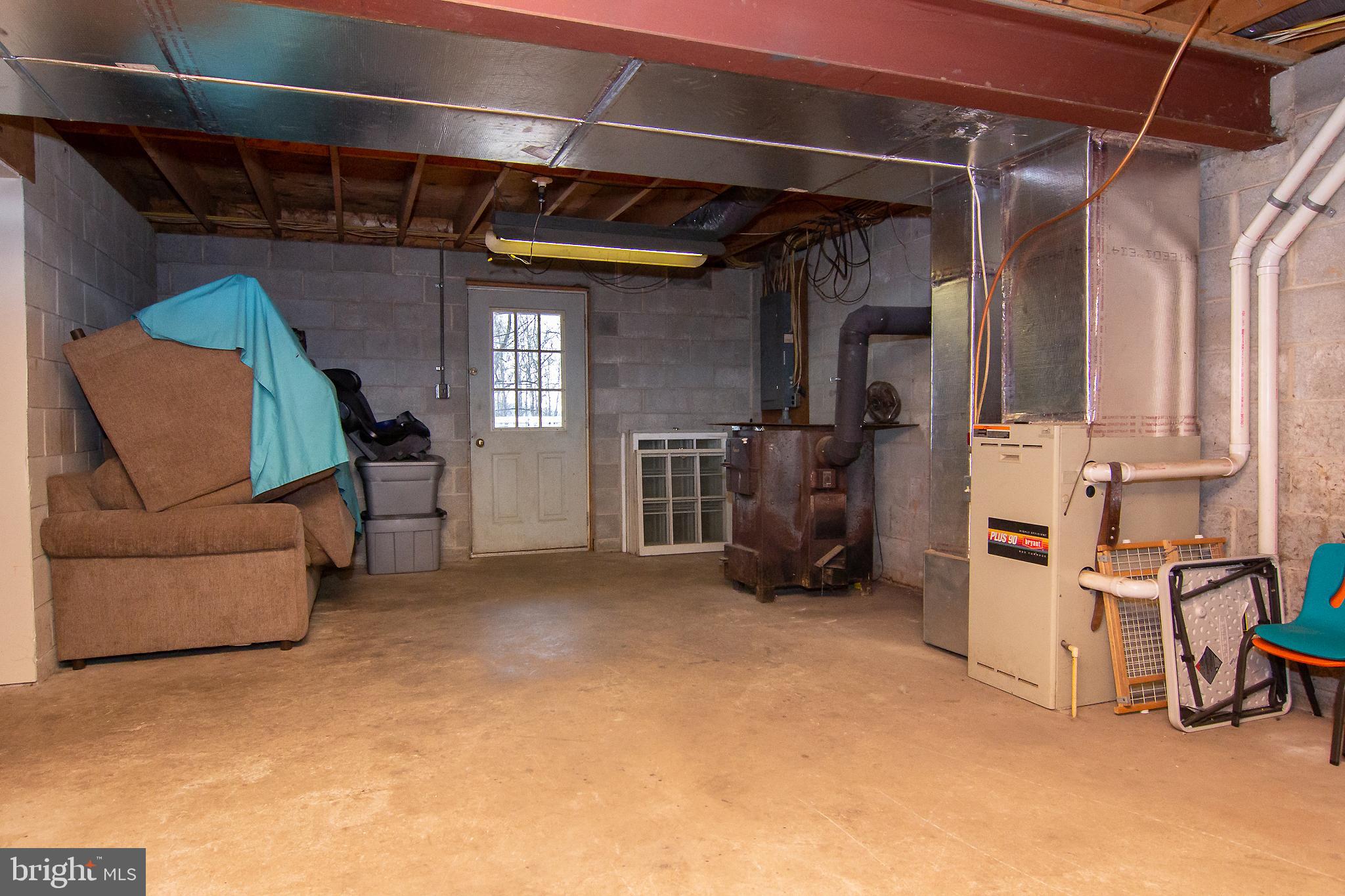 950 Green Springs Road Hanover, PA 17331 - Photo 33 of 42 Workroom/storage w/ door to rear yard