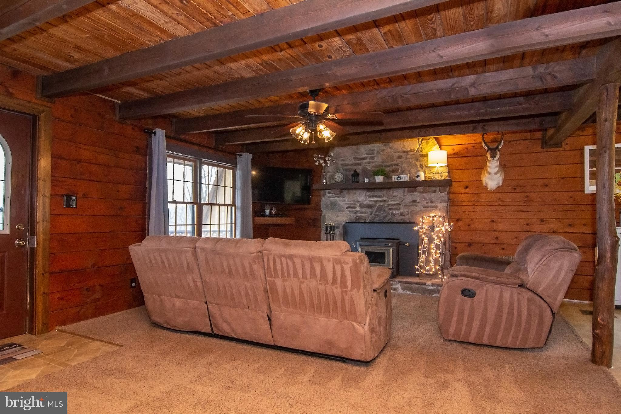 950 Green Springs Road Hanover, PA 17331 - Photo 8 of 42 LR w/ wood beam ceilings , c/fan & carpeted