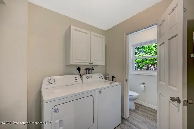 a view of bathroom with a sink and a toilet