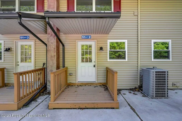 a view of a house with porch