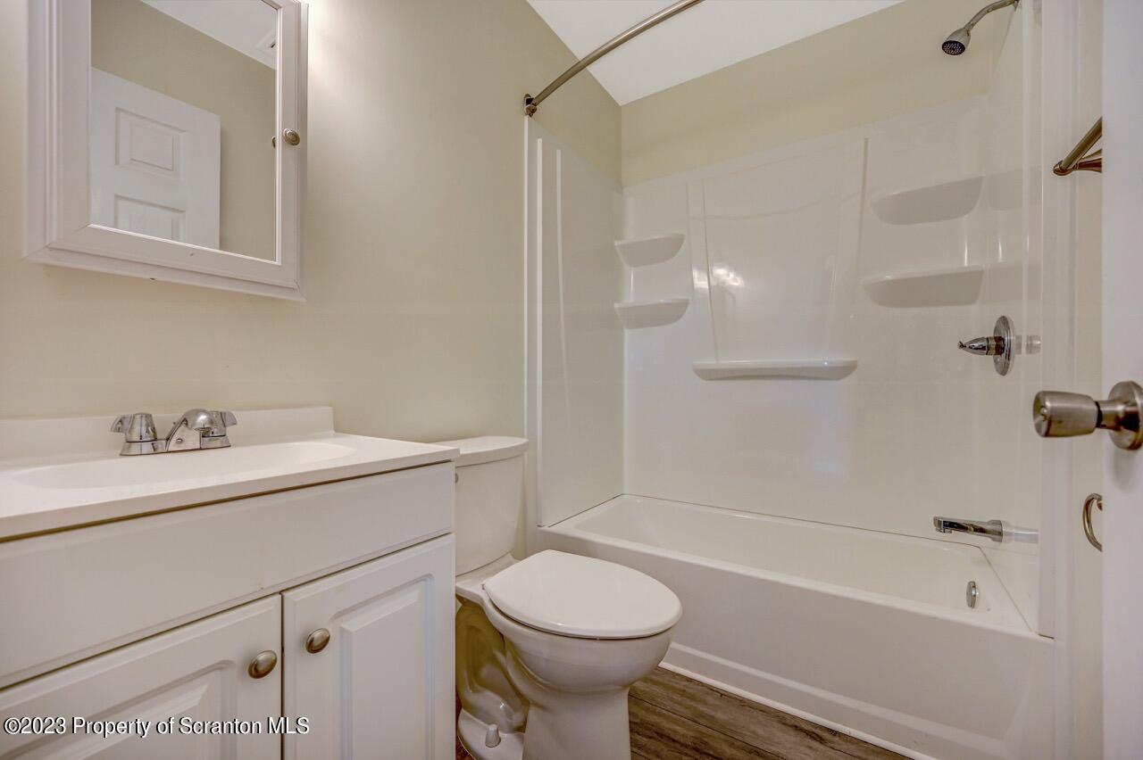 51 Butler Hill Road Lake Ariel, PA 18436 - Photo 22 of 33 a bathroom with a sink toilet vanity and shower