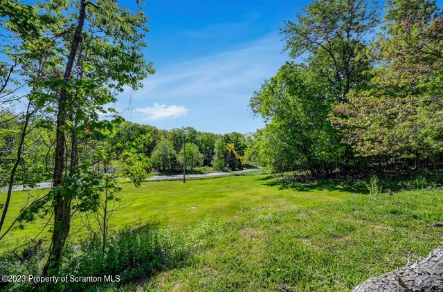 a view of an outdoor space and a yard