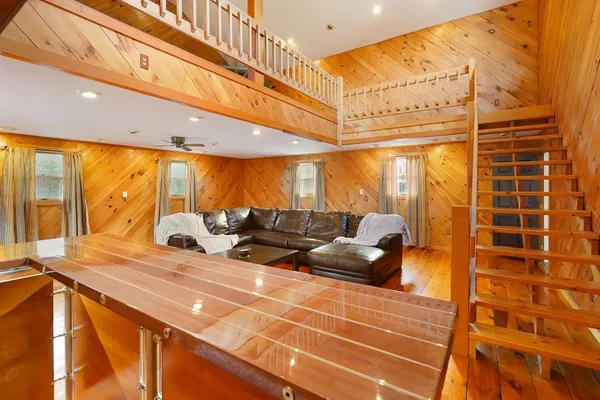 a view of balcony with furniture