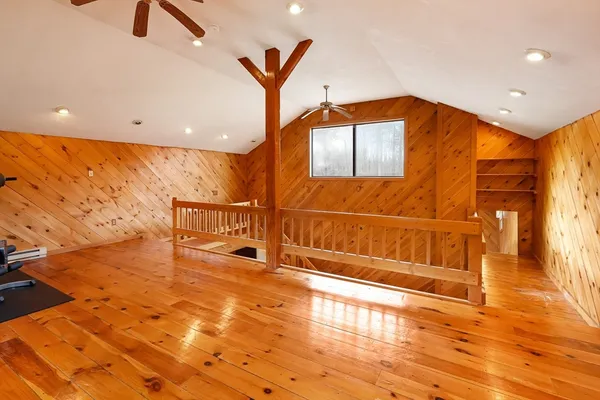 a view of a backyard with sitting area