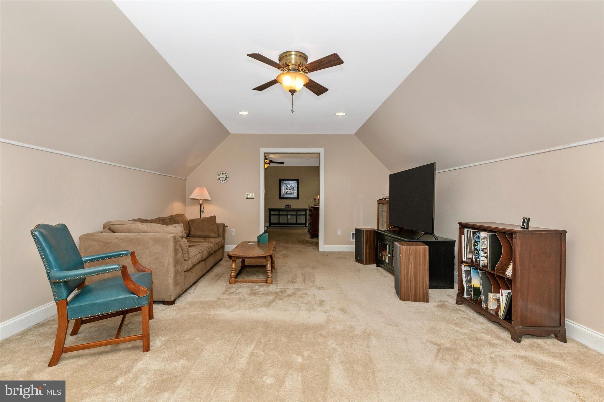 484 Hopewell Road Downingtown, PA 19335 - Photo 33 of 112 Sitting room with valuted ceiling and ceiling fan