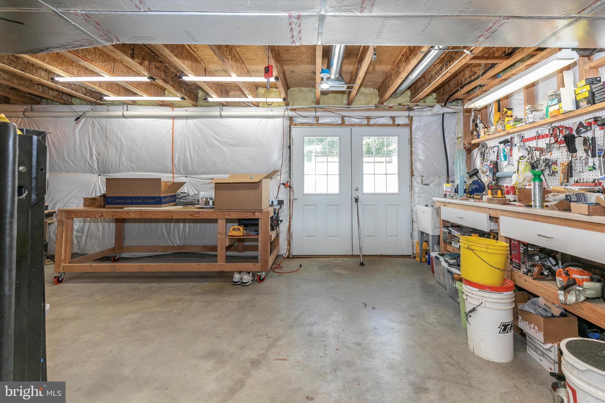 484 Hopewell Road Downingtown, PA 19335 - Photo 48 of 112 Basement workshop with outside access