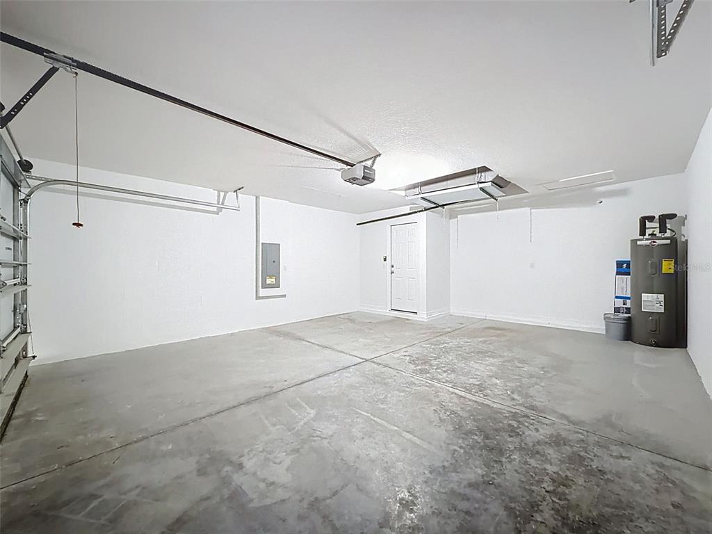 12943 Impatiens Street Spring Hill, FL 34609 - Photo 40 of 53 a view of a garage