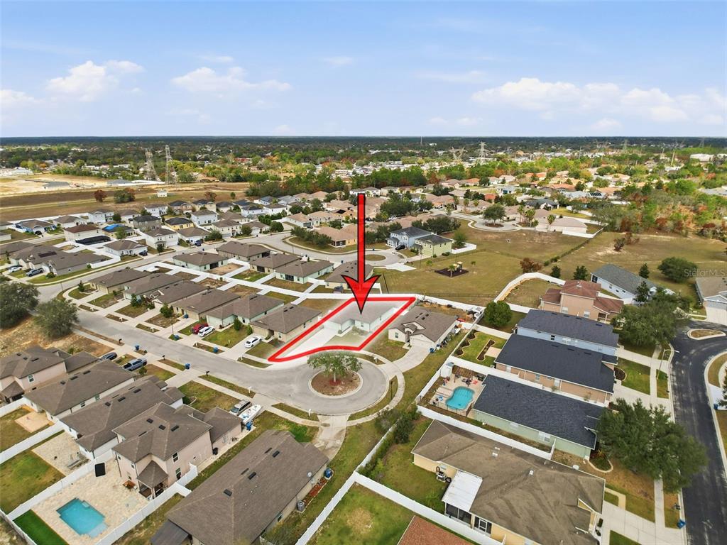 12943 Impatiens Street Spring Hill, FL 34609 - Photo 50 of 53 an aerial view of residential houses with outdoor space