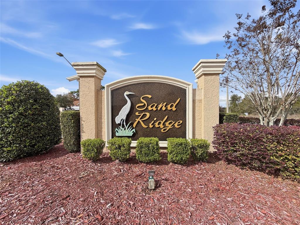 12943 Impatiens Street Spring Hill, FL 34609 - Photo 51 of 53 a sign on the side of a building