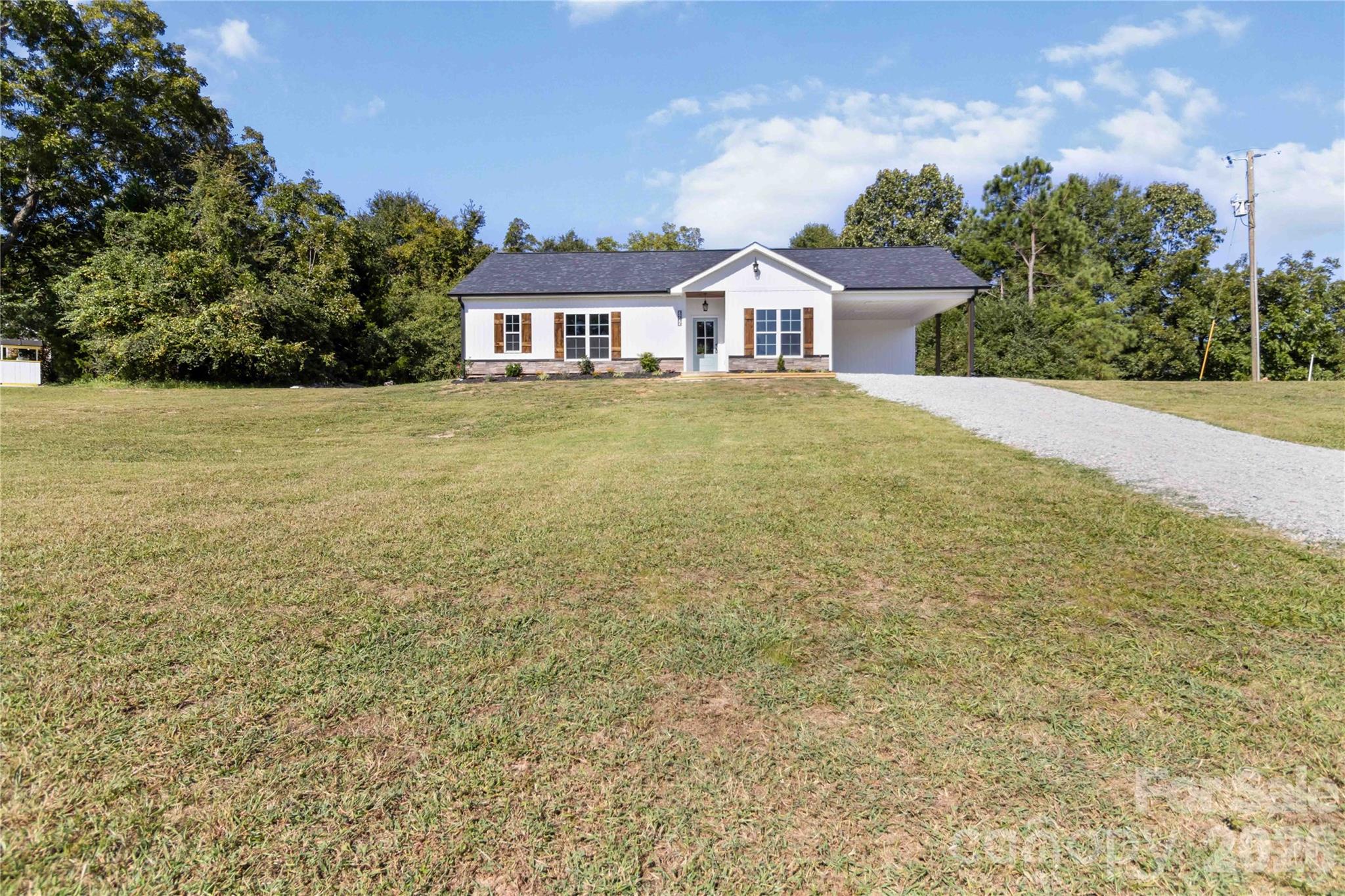 2605 Mt Prospect Road Chester, SC 29706 - Photo 31 of 35 a front view of a house with a yard