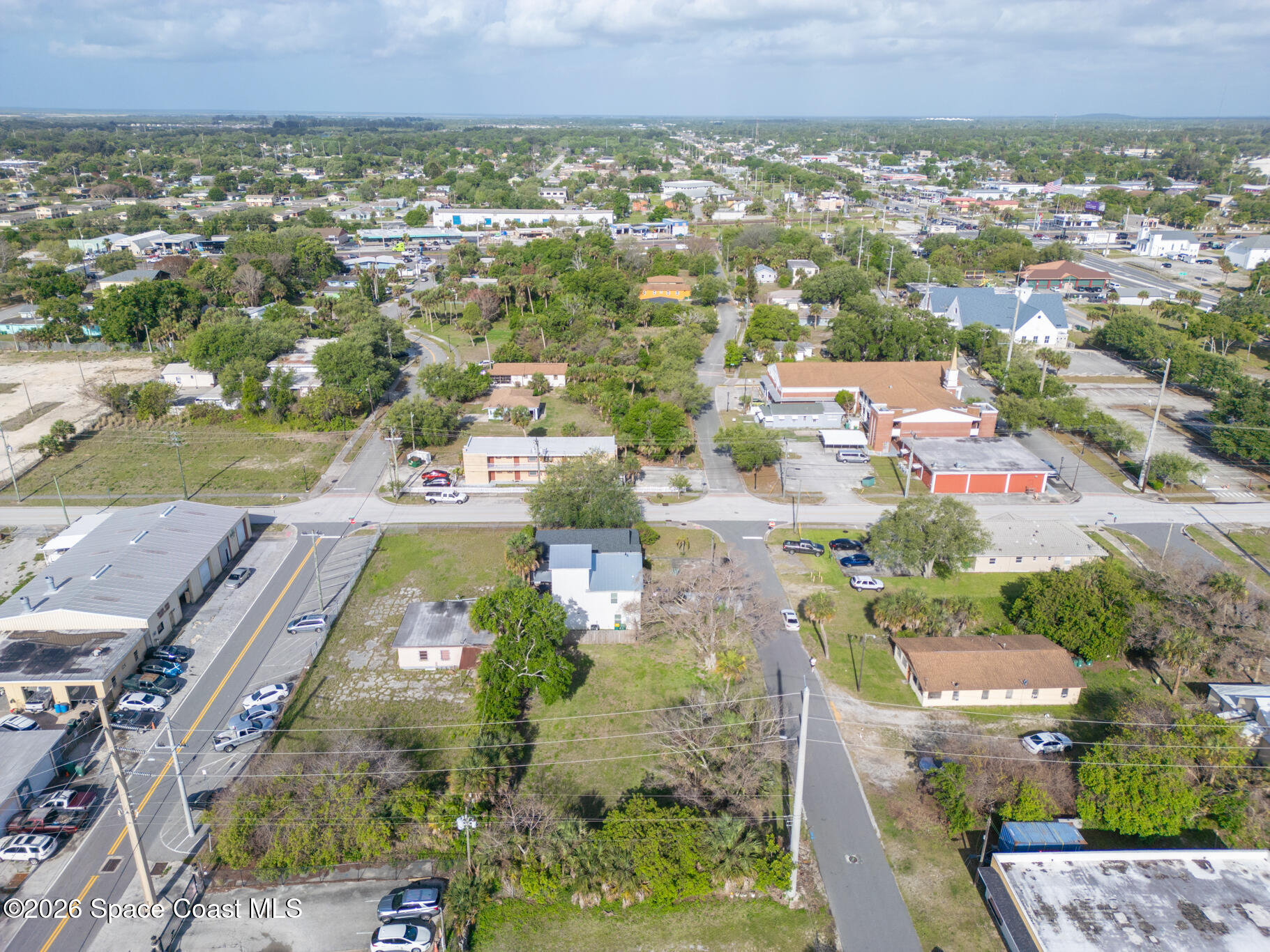 0 Lemon Street Cocoa, FL 32922 - Photo 11 of 14 an aerial view of residential houses with outdoor space