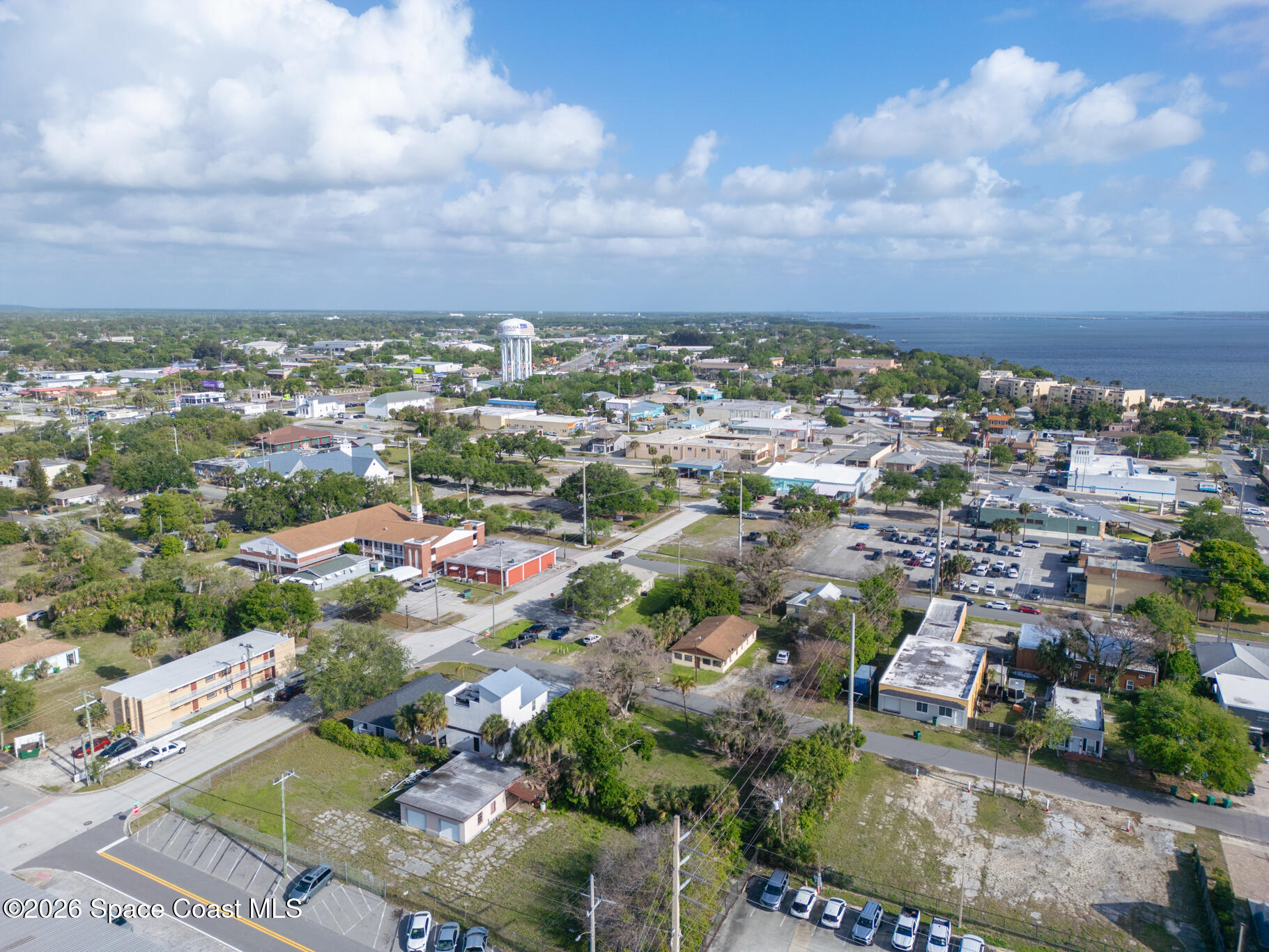 0 Lemon Street Cocoa, FL 32922 - Photo 12 of 14 an aerial view of a city with lots of residential buildings