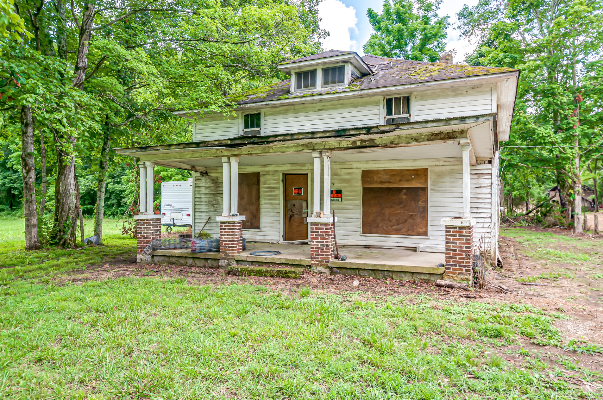 7399 Caney Fork Road Fairview, TN 37062 - Photo 22 of 41 a view of a house with a yard and sitting area