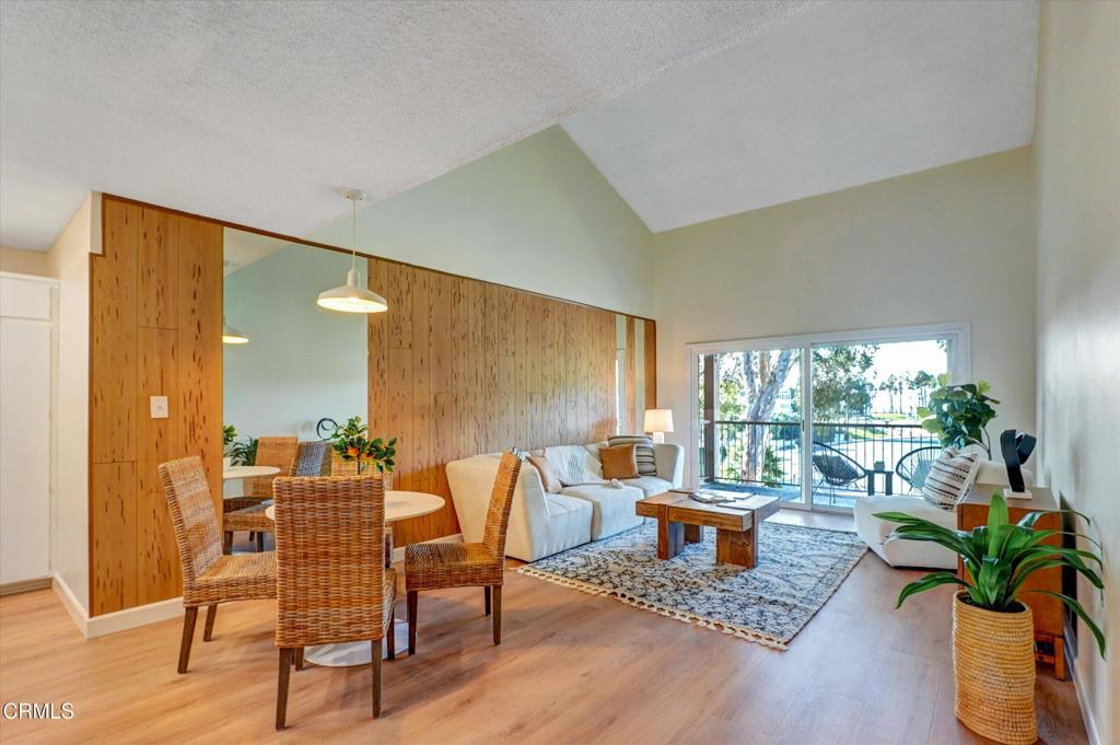 656 Sunfish Way Port Hueneme, CA 93041 - Photo 15 of 52 a living room with furniture and a large window