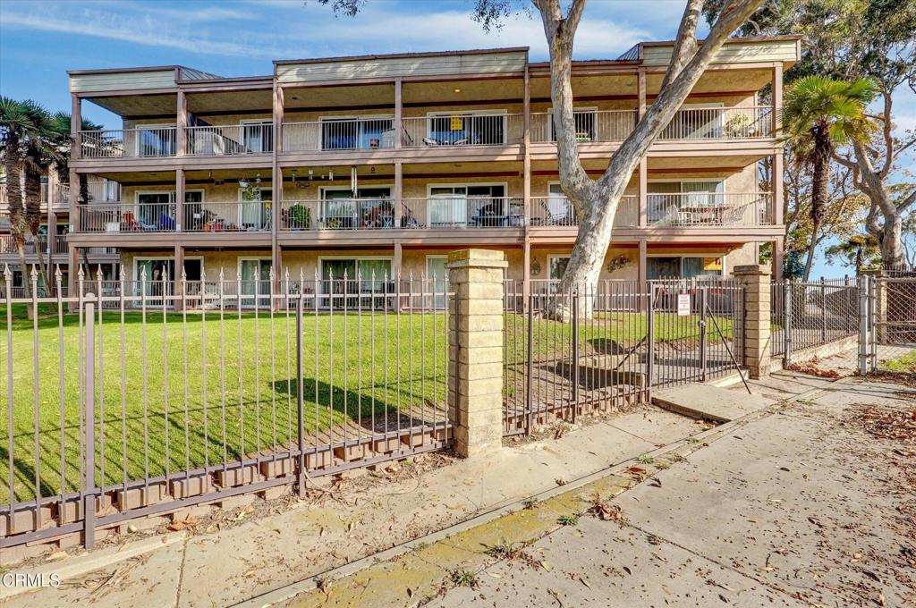 656 Sunfish Way Port Hueneme, CA 93041 - Photo 27 of 52 front view of a building with a swimming pool