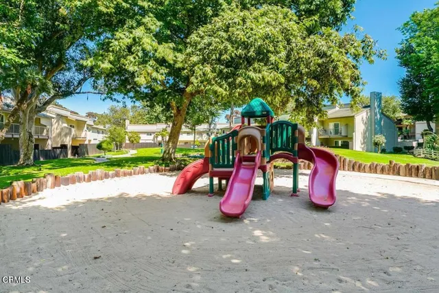 a view of a park with swings