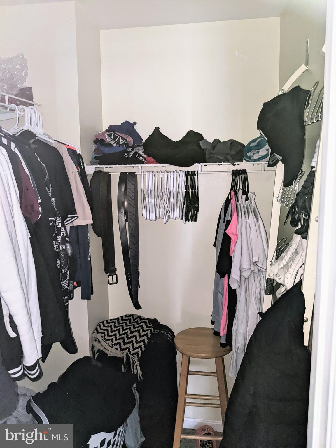 7372 Rokeby Drive Manassas, VA 20109 - Photo 14 of 21 a view of walk in closet with clothes and shoes