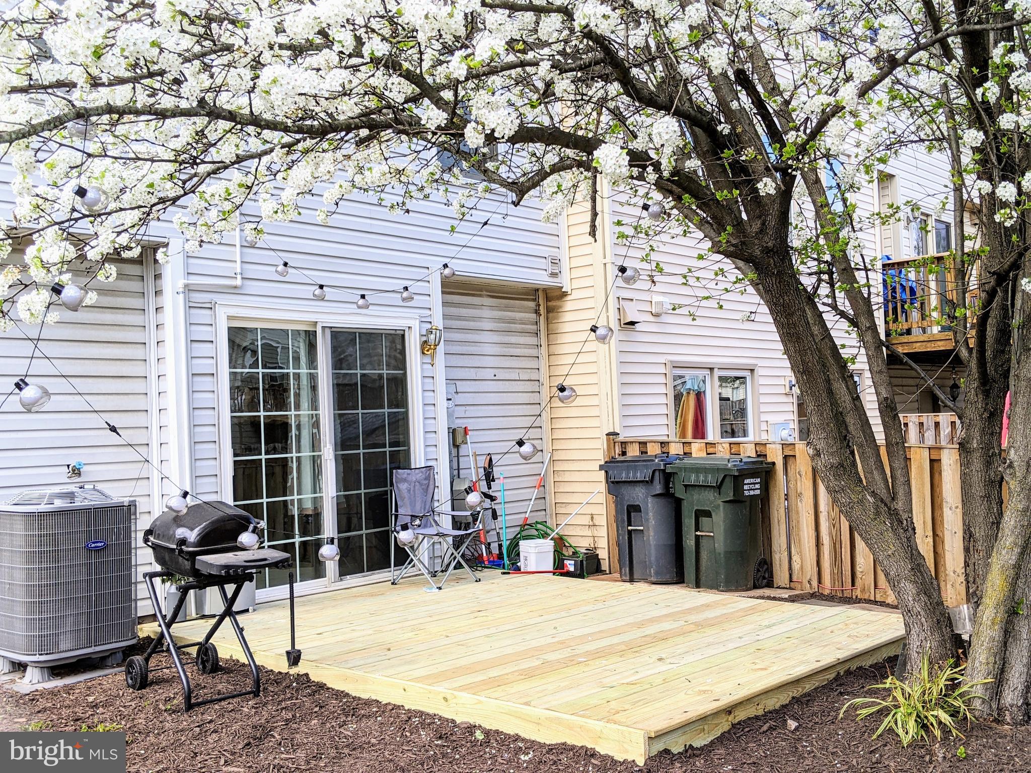 7372 Rokeby Drive Manassas, VA 20109 - Photo 19 of 21 a backyard of a house with seating space