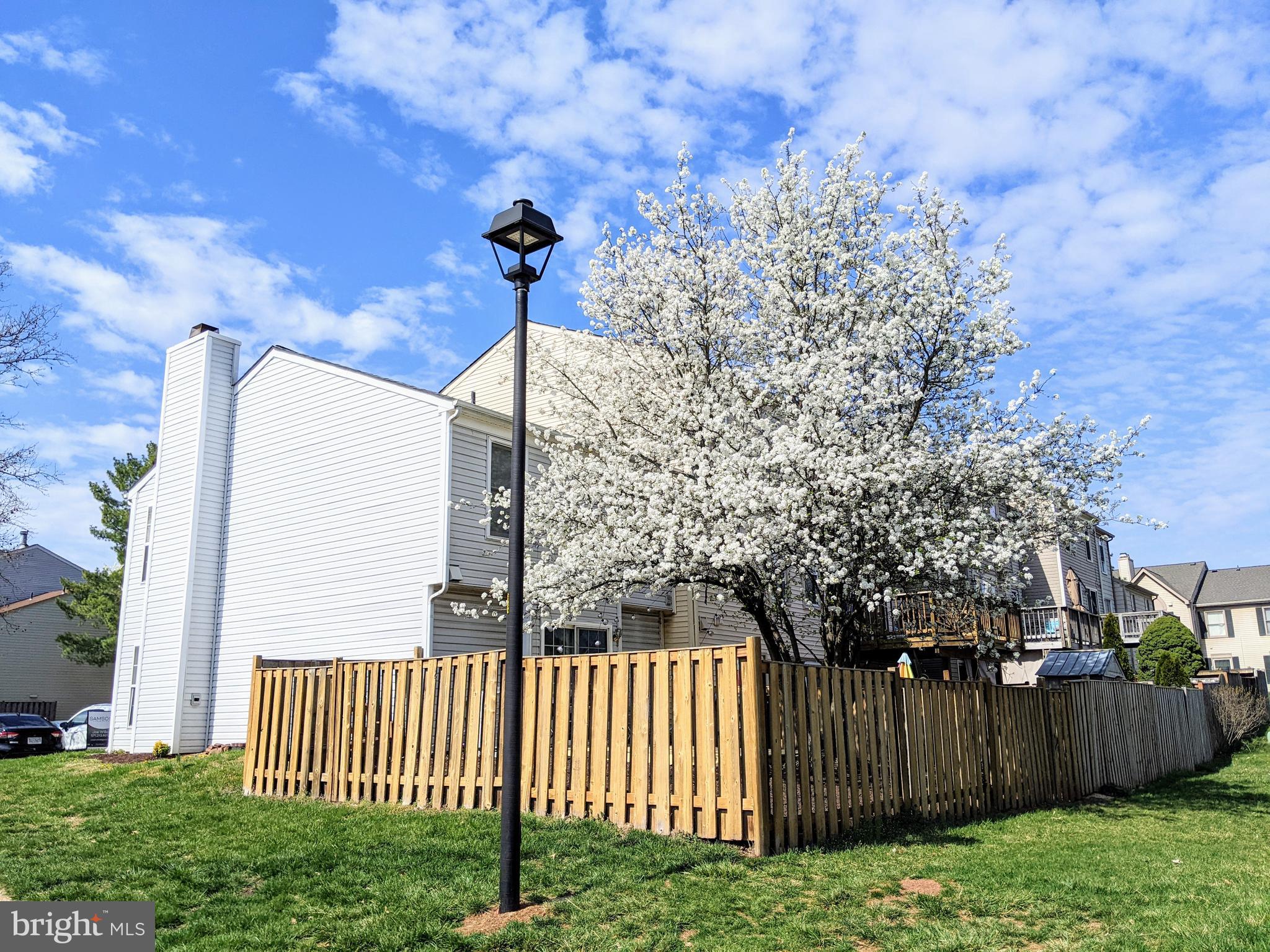 7372 Rokeby Drive Manassas, VA 20109 - Photo 4 of 21 a front view of a house with a fence