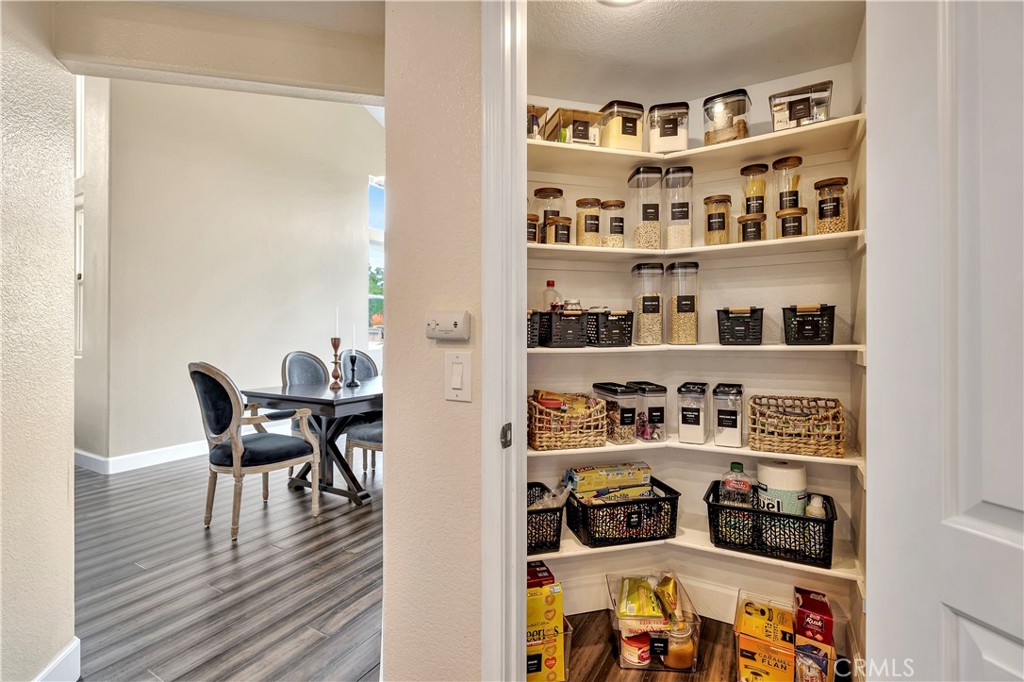 3171 Diamond View Street Corona, CA 92882 - Photo 14 of 49 a workspace with furniture and book shelf