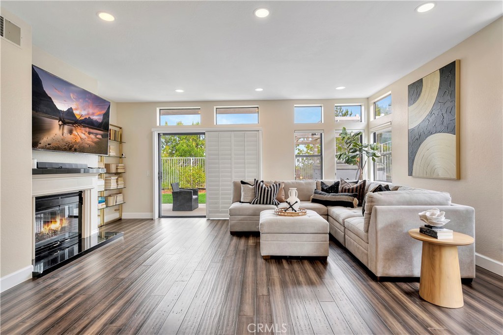 3171 Diamond View Street Corona, CA 92882 - Photo 18 of 49 a living room with furniture fireplace and flat screen tv