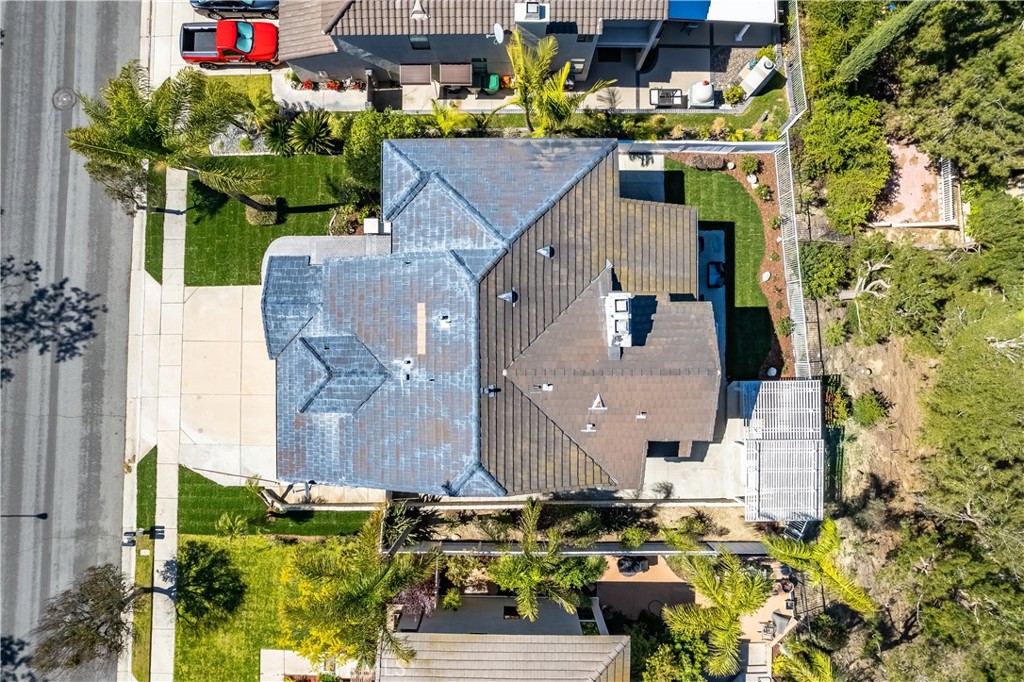 3171 Diamond View Street Corona, CA 92882 - Photo 25 of 49 an aerial view of multiple houses with yard