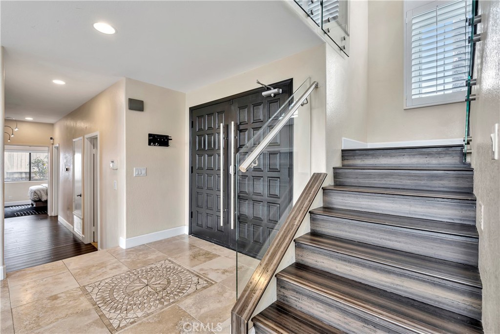 3171 Diamond View Street Corona, CA 92882 - Photo 30 of 49 a view of entryway with wooden floor and stairs