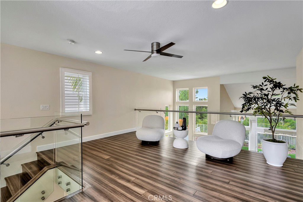 3171 Diamond View Street Corona, CA 92882 - Photo 32 of 49 a living room with furniture and a potted plant