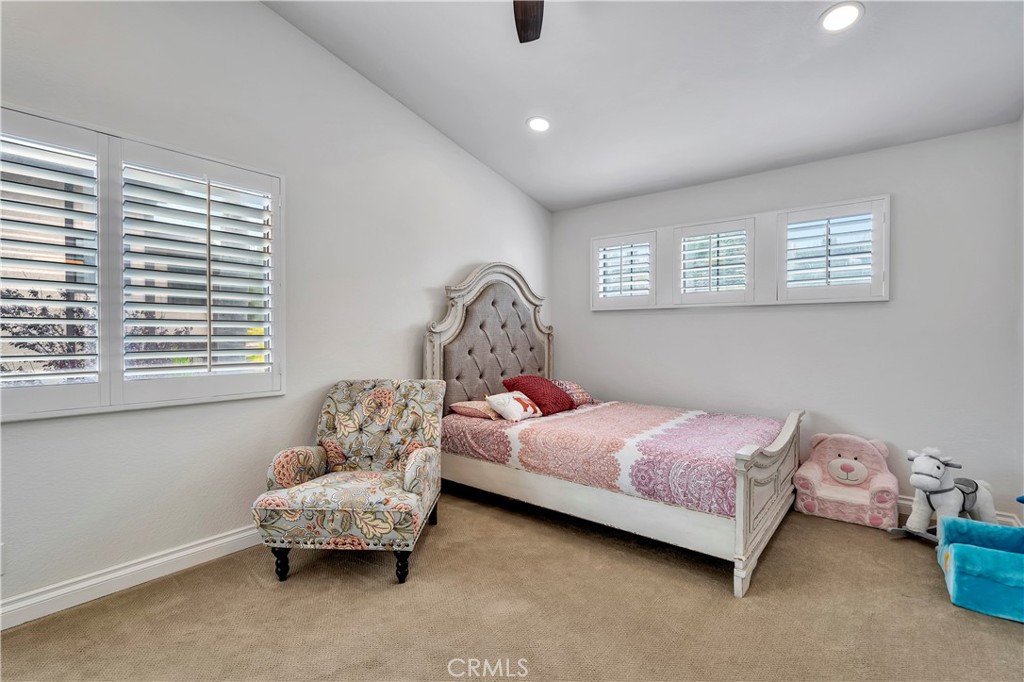 3171 Diamond View Street Corona, CA 92882 - Photo 44 of 49 a bedroom with bed and window