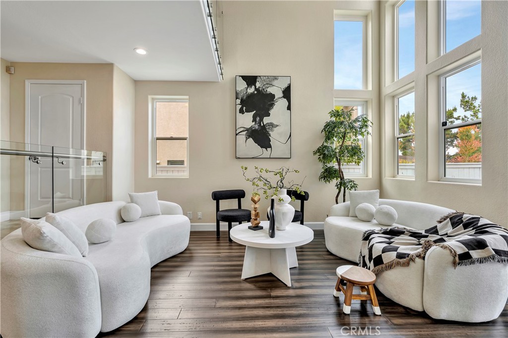 3171 Diamond View Street Corona, CA 92882 - Photo 8 of 49 a living room with furniture and a large window