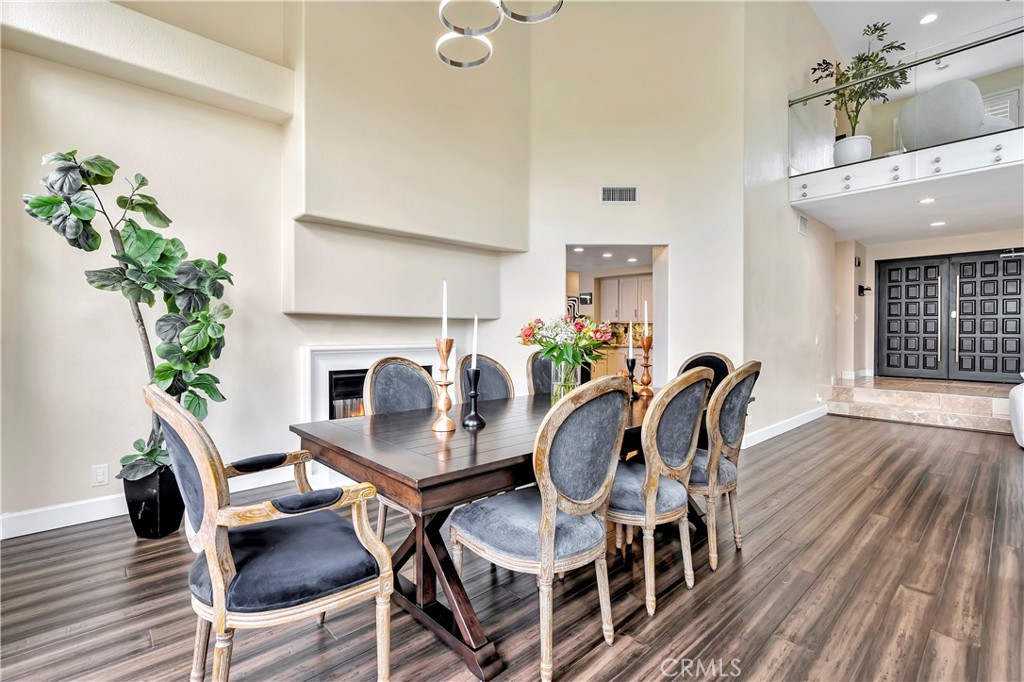 3171 Diamond View Street Corona, CA 92882 - Photo 10 of 49 a view of a dining room with furniture and wooden floor
