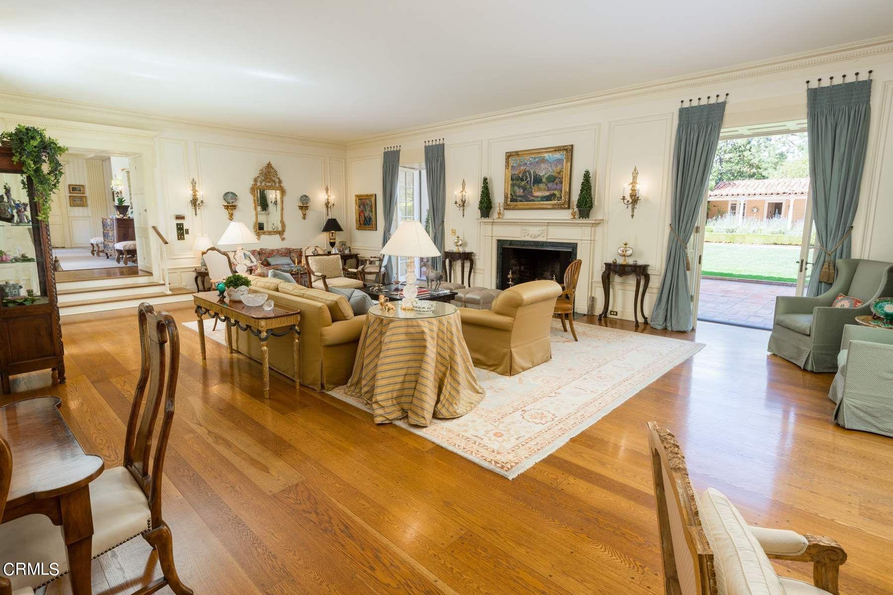1585 Orlando Road Pasadena, CA 91106 - Photo 11 of 47 a living room with fireplace furniture and a large window