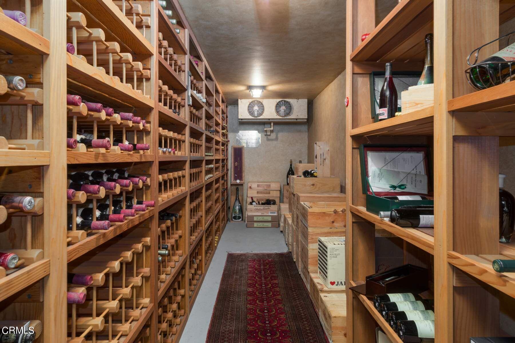 1585 Orlando Road Pasadena, CA 91106 - Photo 19 of 47 a view of a living room with clothes and shoes