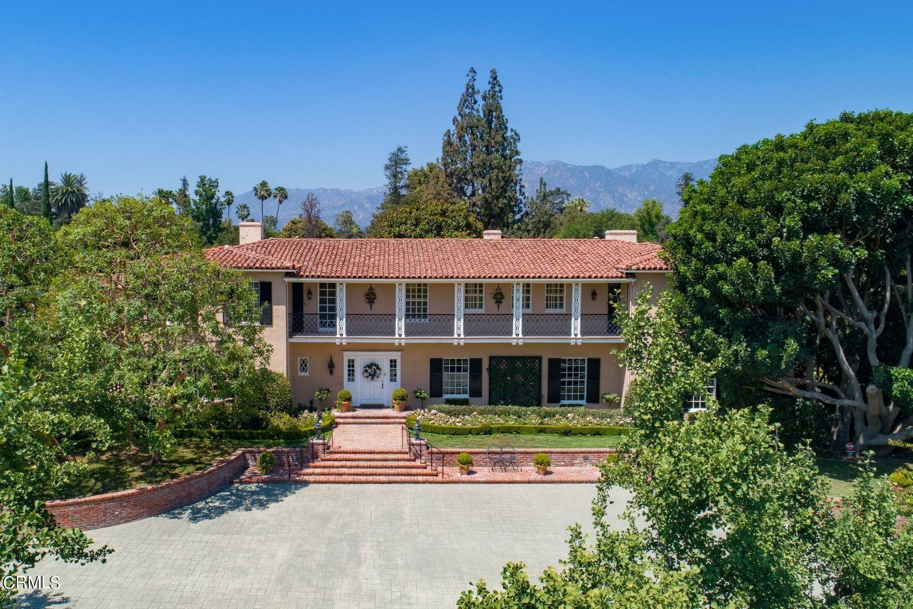 1585 Orlando Road Pasadena, CA 91106 - Photo 3 of 47 a front view of a house with a yard