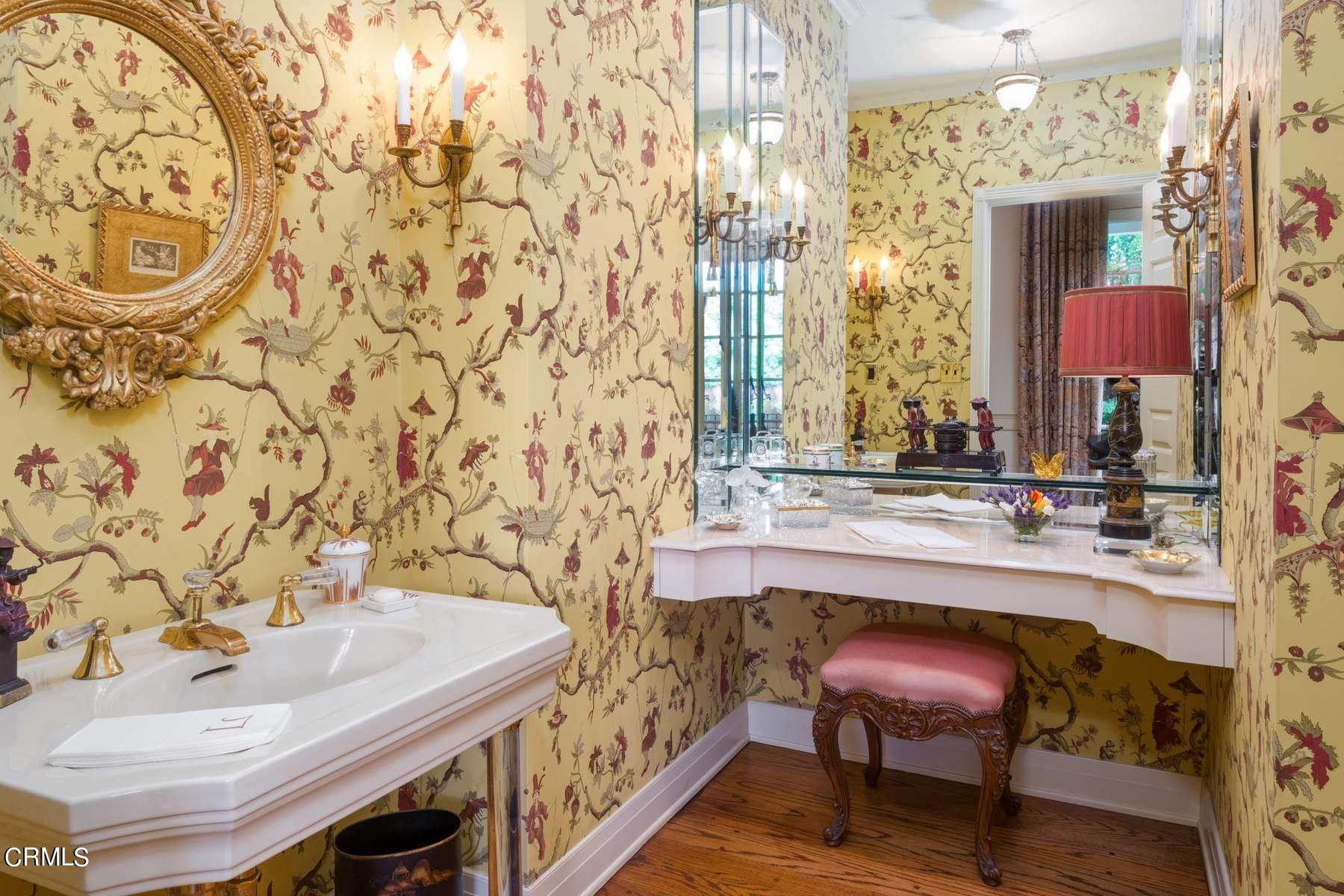 1585 Orlando Road Pasadena, CA 91106 - Photo 21 of 47 a bathroom with a sink and a mirror