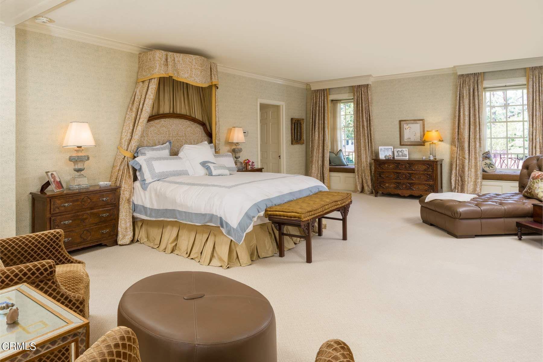 1585 Orlando Road Pasadena, CA 91106 - Photo 23 of 47 a bedroom with a bed and wooden floor