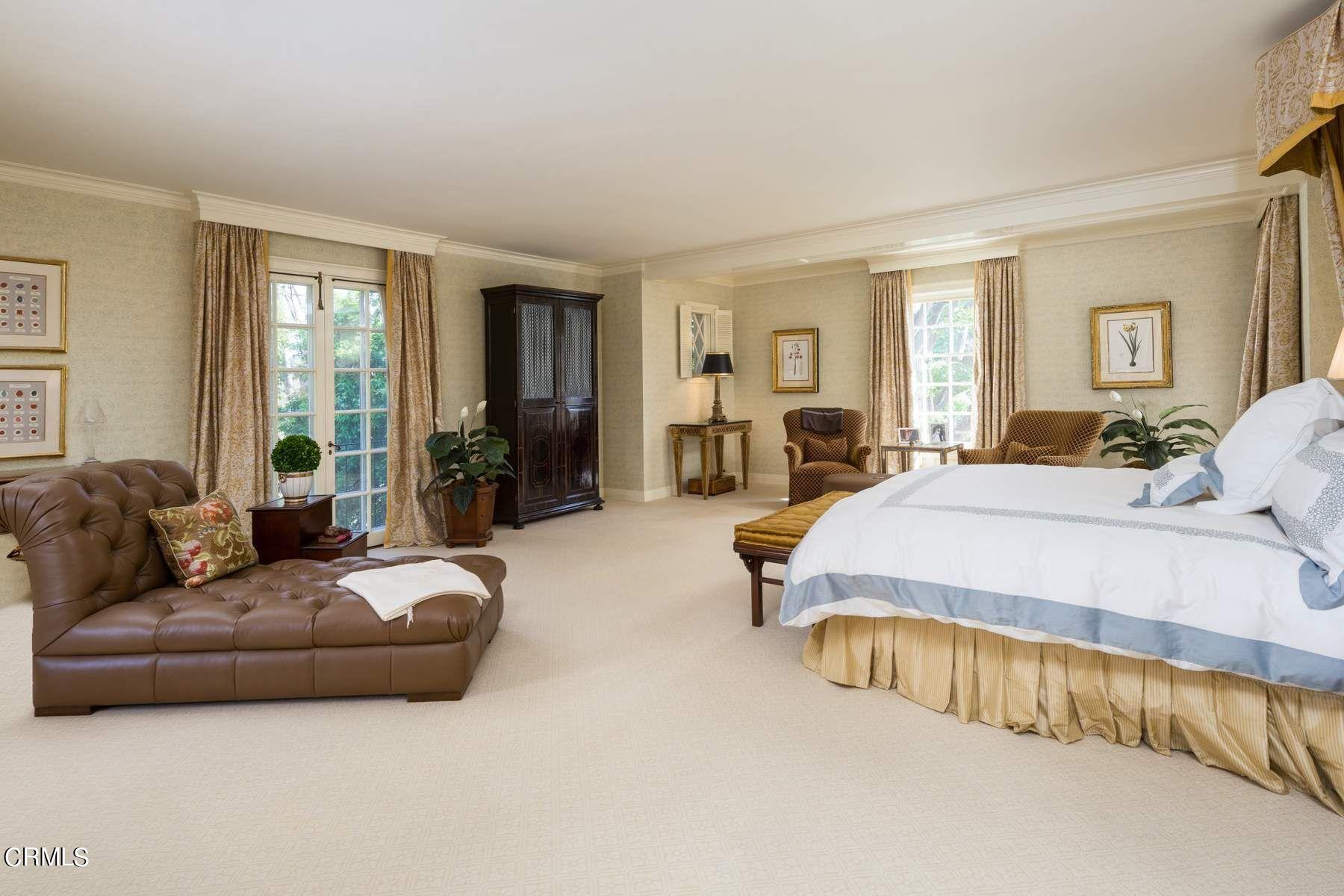 1585 Orlando Road Pasadena, CA 91106 - Photo 24 of 47 a spacious bedroom with a bed and glass window