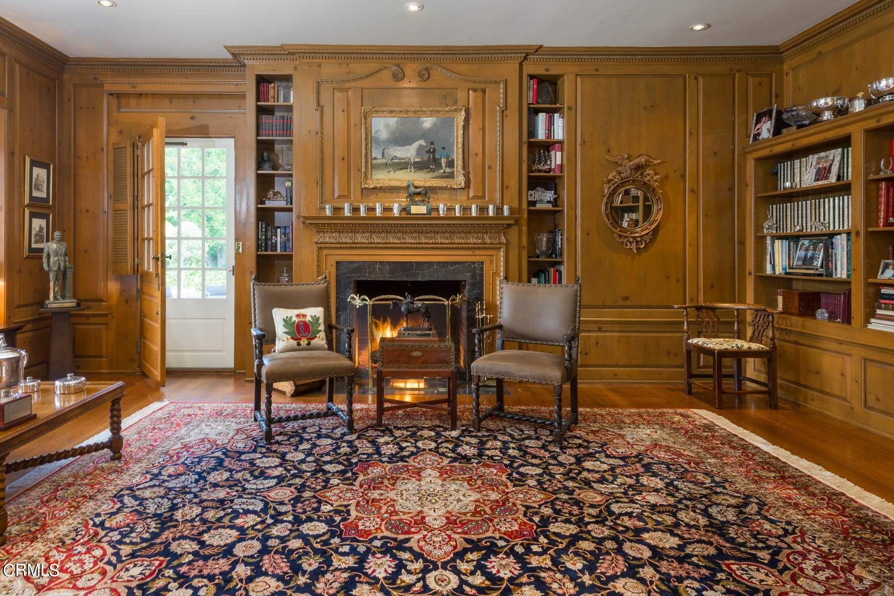 1585 Orlando Road Pasadena, CA 91106 - Photo 4 of 47 a living room with furniture a flat screen tv and a fireplace