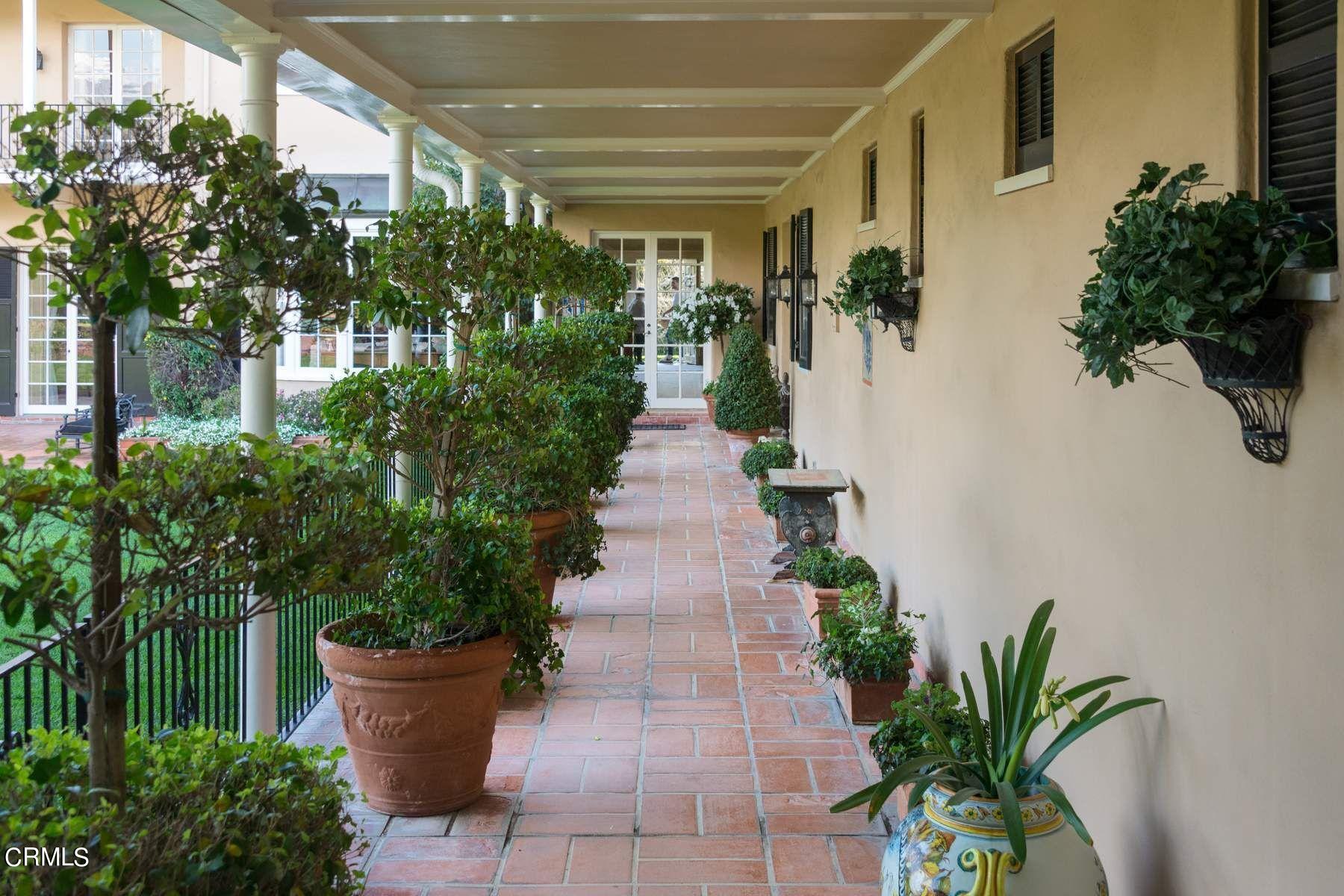 1585 Orlando Road Pasadena, CA 91106 - Photo 33 of 47 a view of a pathway with flower pots