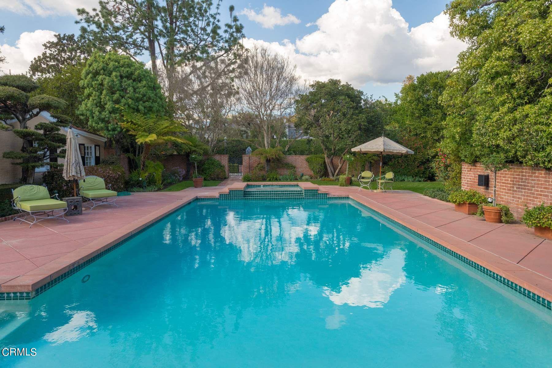 1585 Orlando Road Pasadena, CA 91106 - Photo 38 of 47 a swimming pool with trees in the background