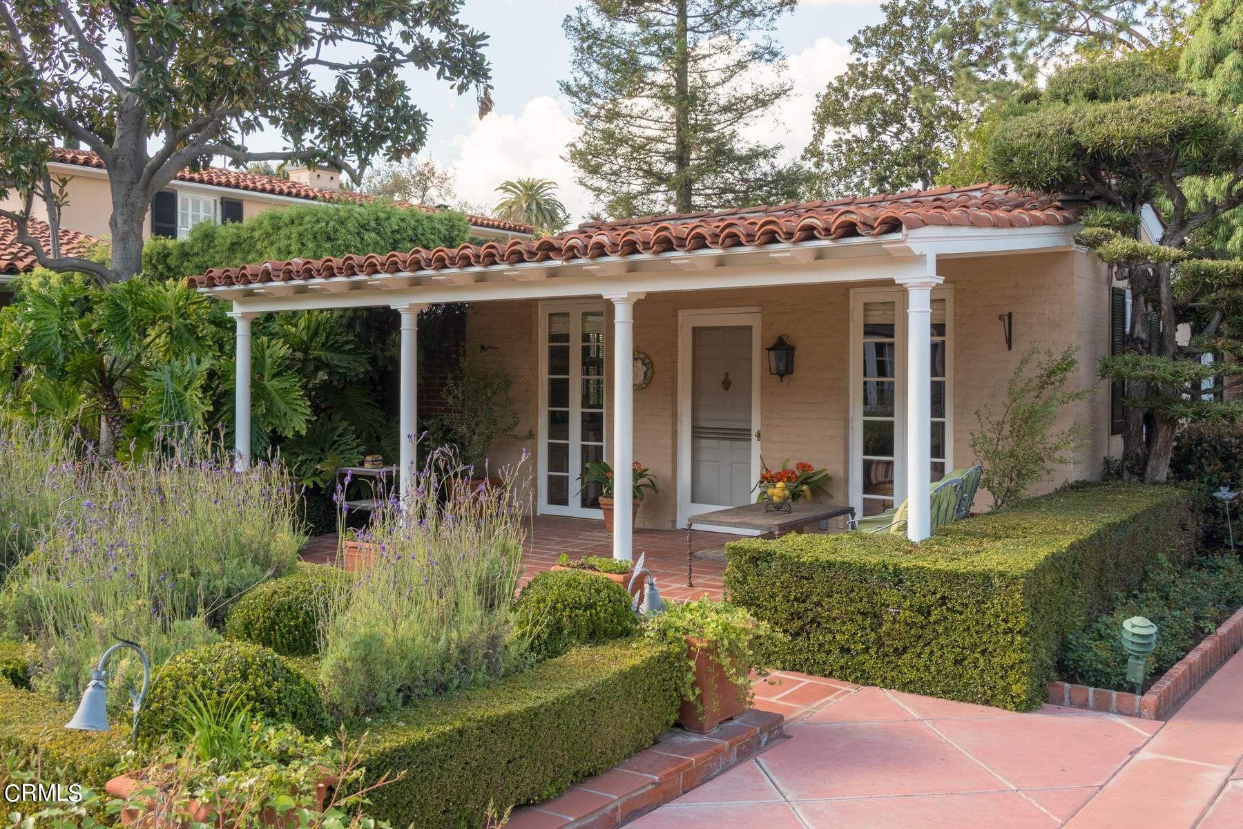 1585 Orlando Road Pasadena, CA 91106 - Photo 39 of 47 a view of a house with backyard sitting area and garden