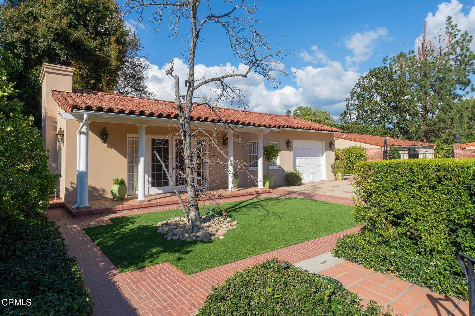 1585 Orlando Road Pasadena, CA 91106 - Photo 42 of 47 front view of a house with a yard