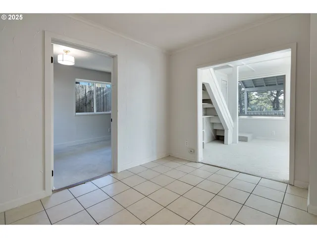 a view of an empty room and window
