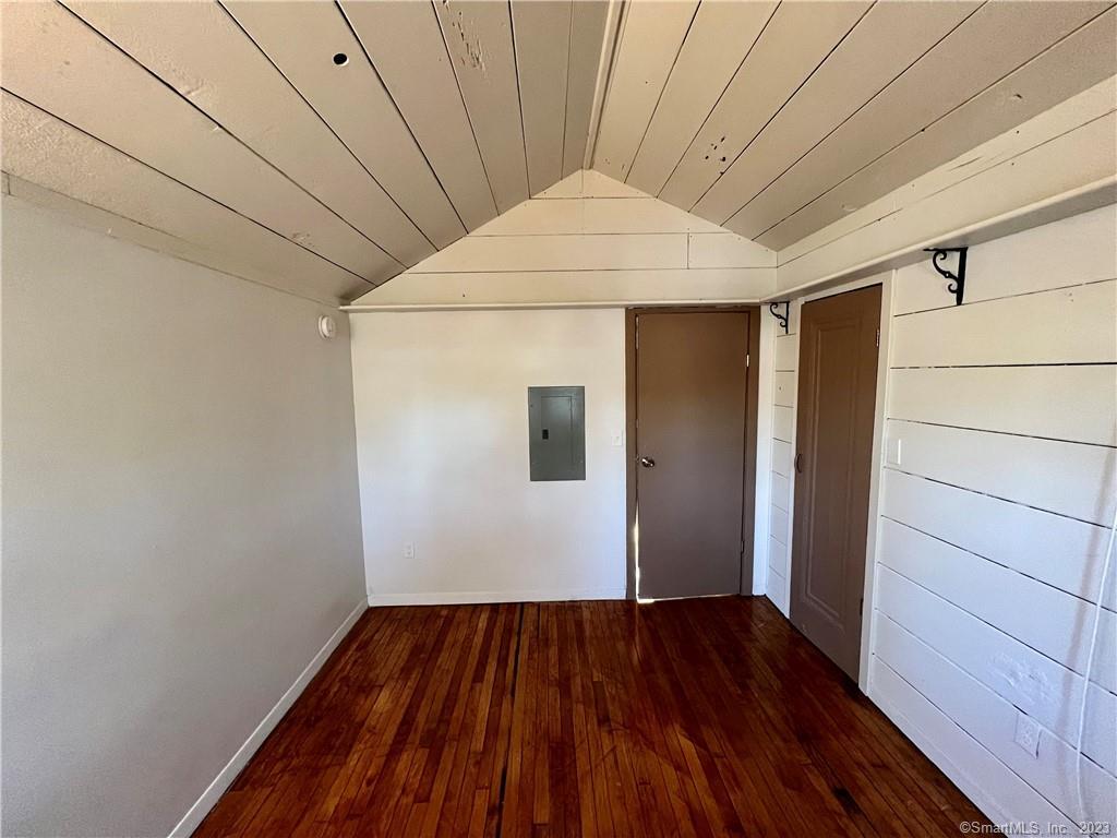 39 Waterbury Road, Unit E3 Prospect, CT 06712 - Photo 9 of 17 a view of empty room with wooden floor