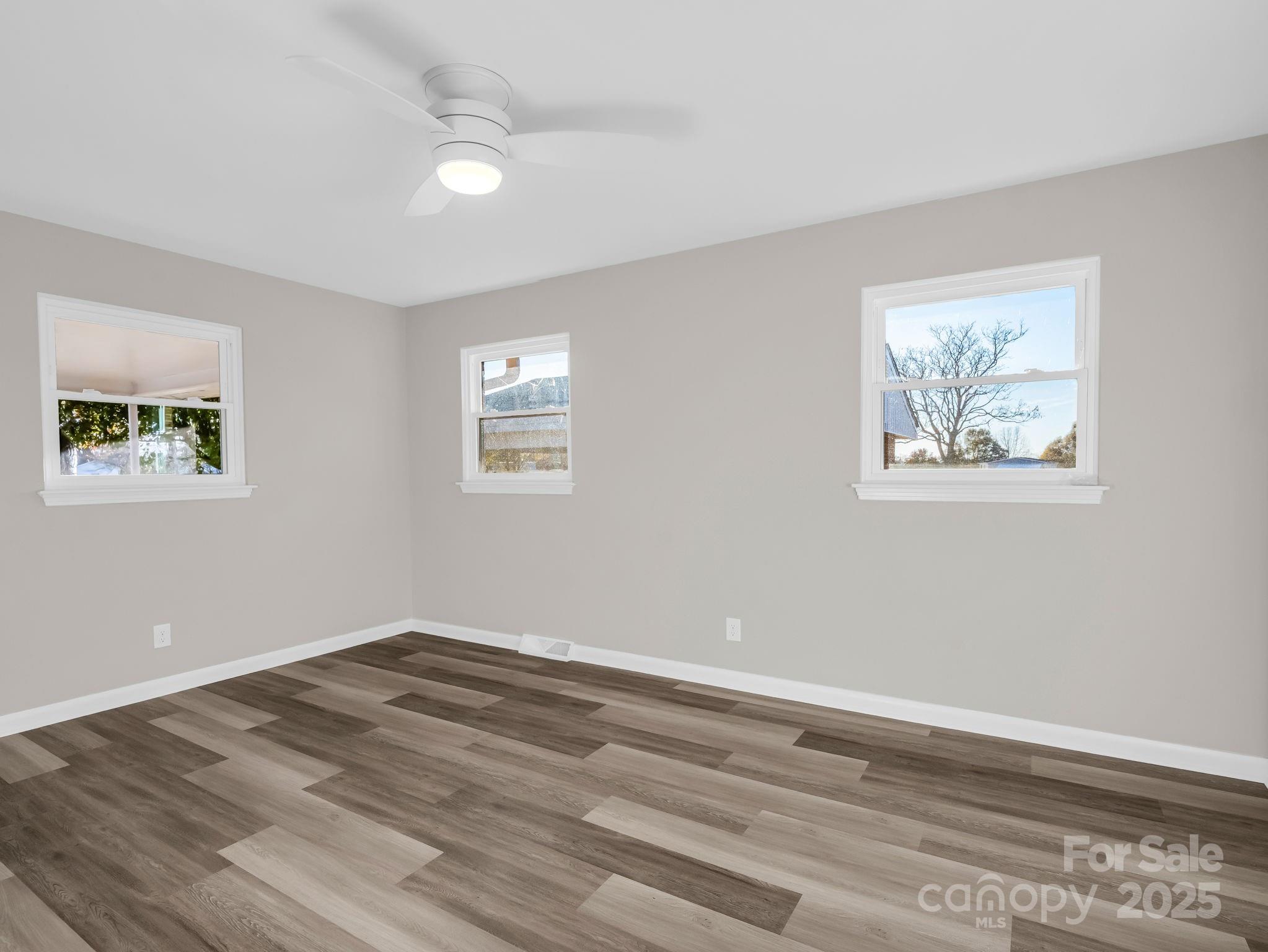 1696 Race Path Church Road Mooresboro, NC 28114 - Photo 15 of 31 a view of empty room with wooden floor