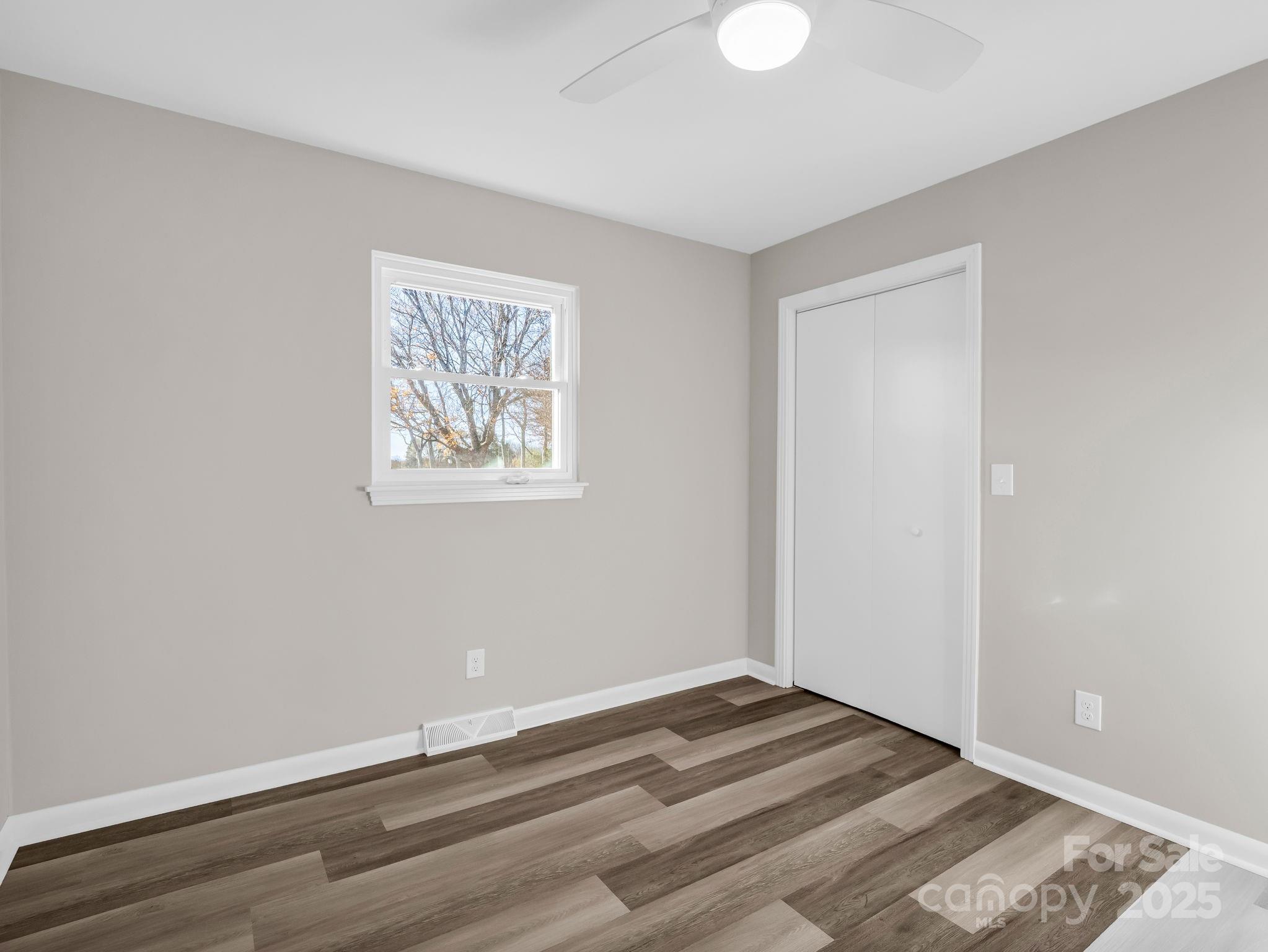1696 Race Path Church Road Mooresboro, NC 28114 - Photo 22 of 31 a view of room with wooden floor and window