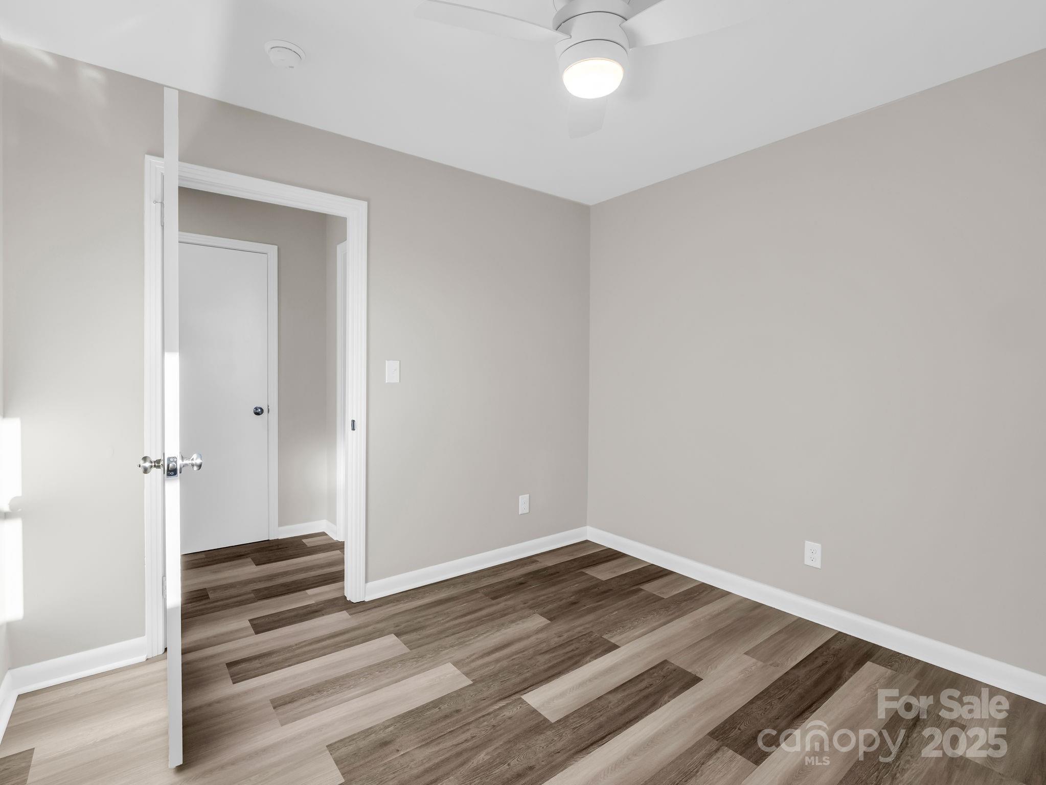 1696 Race Path Church Road Mooresboro, NC 28114 - Photo 23 of 31 wooden floor in an empty room
