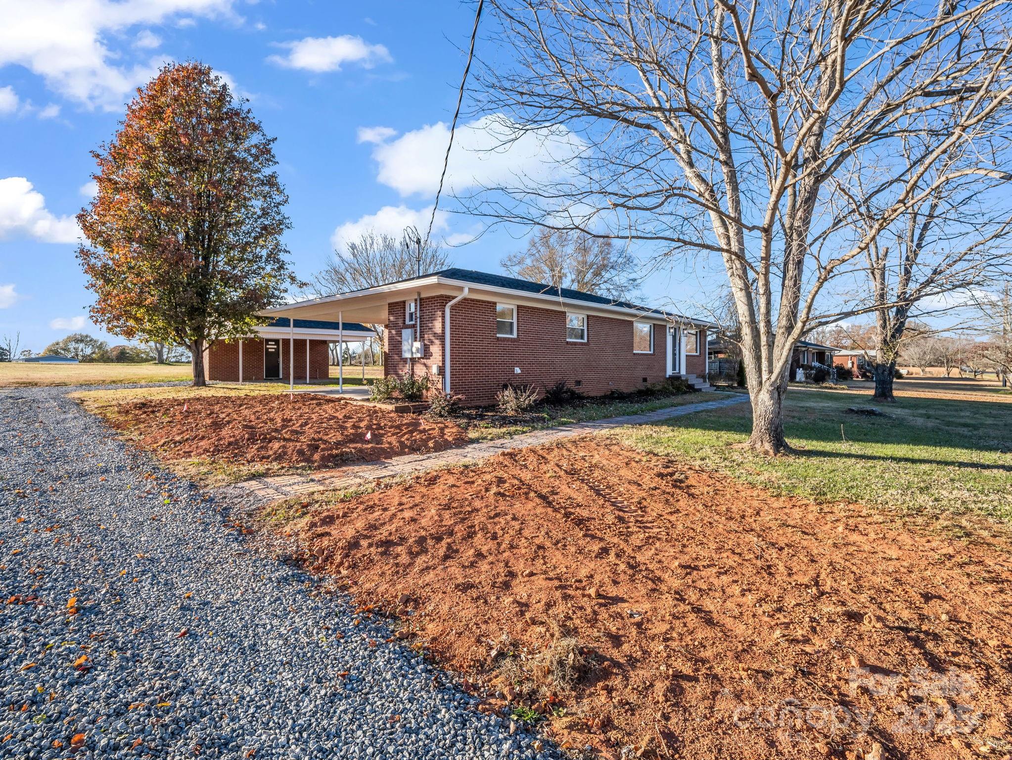 1696 Race Path Church Road Mooresboro, NC 28114 - Photo 28 of 31 a front view of a house with a yard