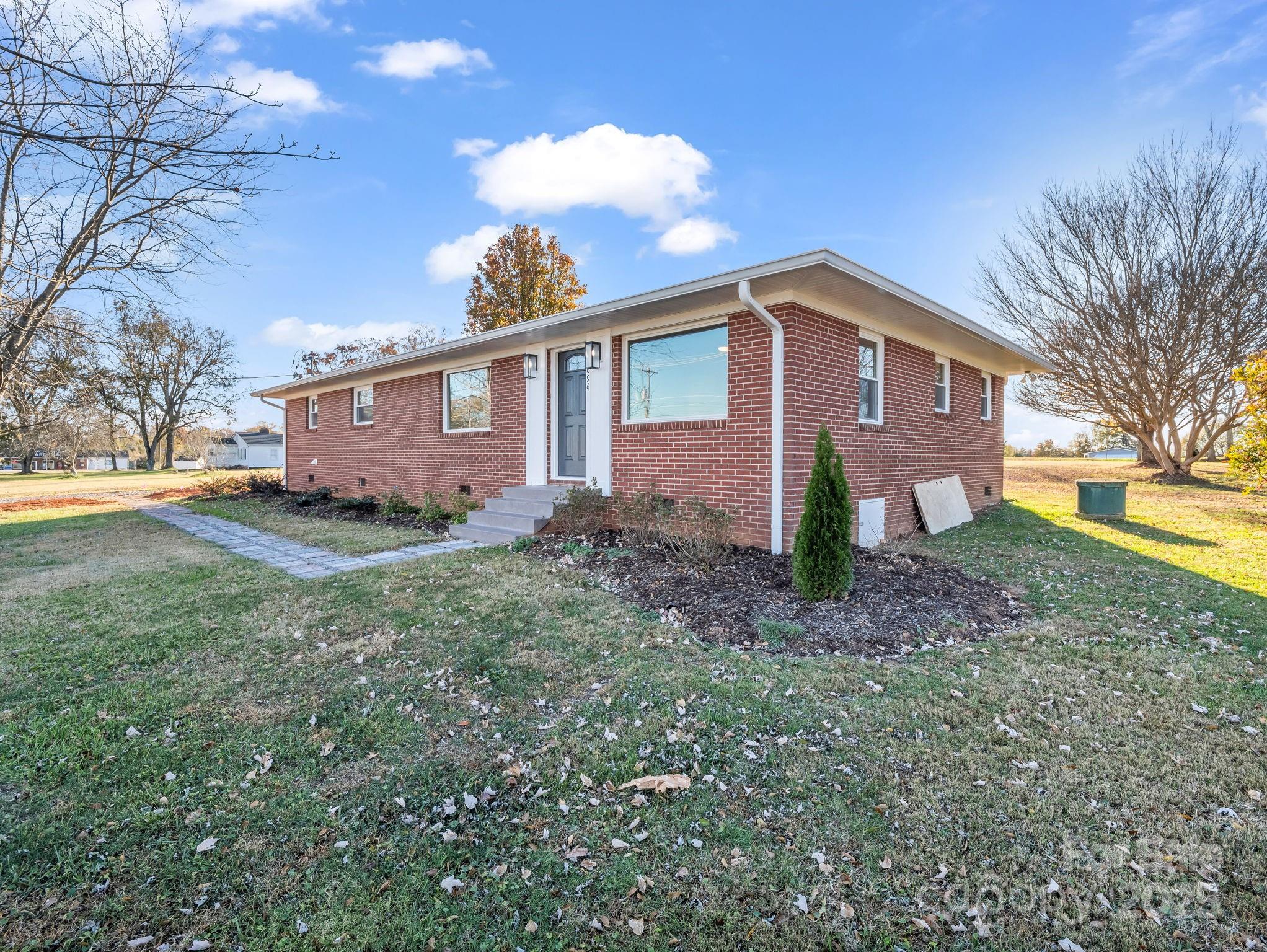 1696 Race Path Church Road Mooresboro, NC 28114 - Photo 3 of 31 a view of a house with a yard