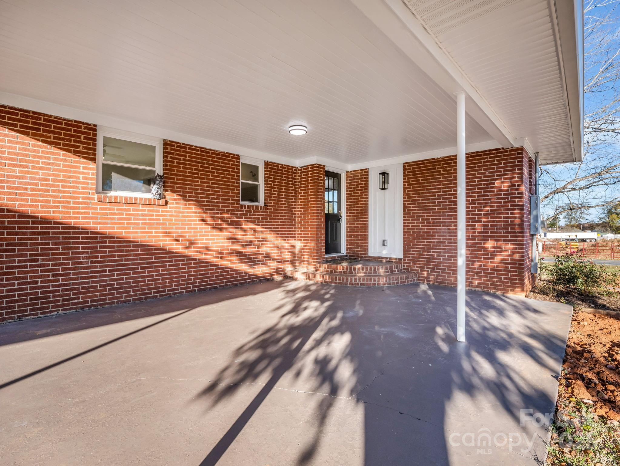 1696 Race Path Church Road Mooresboro, NC 28114 - Photo 4 of 31 a view of a house with backyard